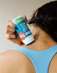 Blue Stop max product applying on her nape